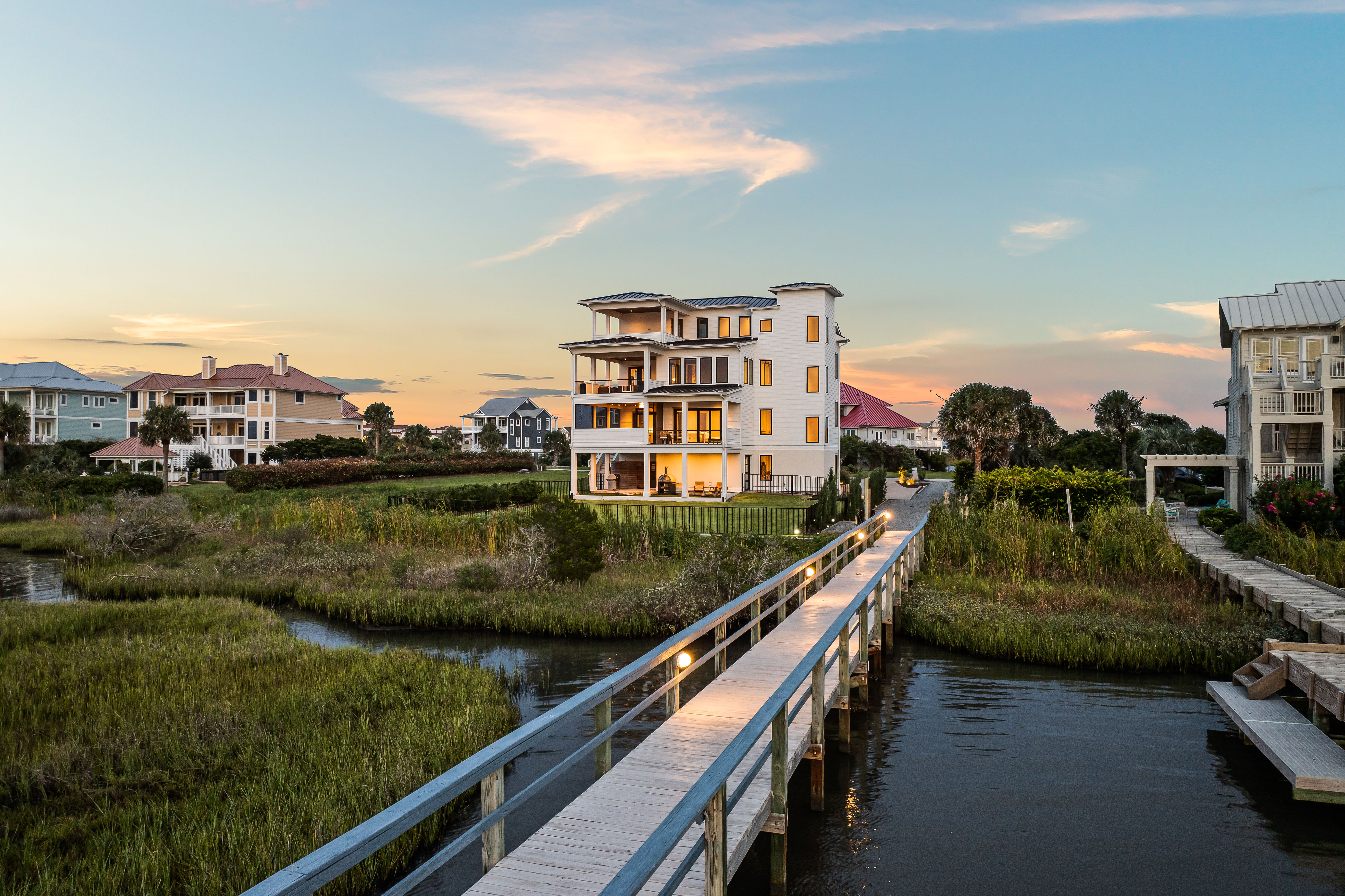 The private dock leading back toward 23 Sailview at sunset